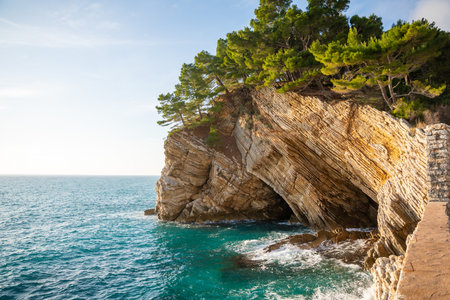 Coast landscape with rocks, sea and vegetation near ancient fort in Petrovac, Montenegro in winter time. High quality photoの写真素材