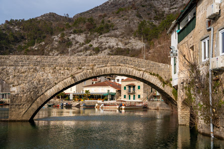 Arched bridge over Crnojevic river in small town near Skadar lake in Montenegro in winter time. High quality photoの写真素材