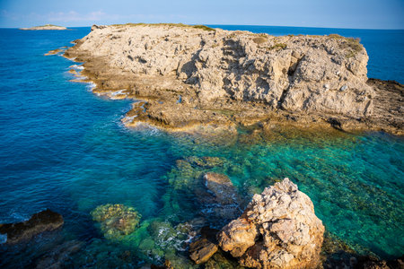 View of Kape Apostolos and Kleides Islands at the very eastern tip of the Karpasia Peninsula in the Turkish Republic of Northern Cyprus. Most easterly point on mainland Cyprus. High quality photoの写真素材