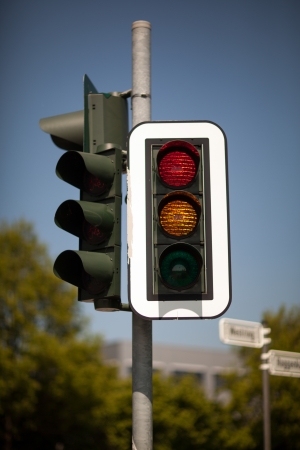 Set of traffic lights showing red and amber for get readyの写真素材