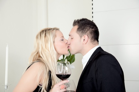 A romantic couple is kissing の写真素材