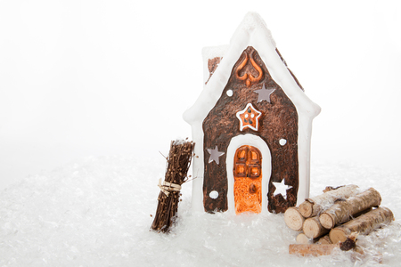 A isolated Gingerbread House with some wooden stuff の写真素材