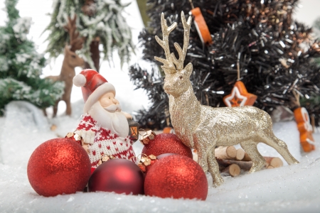 Santa Claus meets the reindeer on the way to the christmas tree and had a small discussion with him の写真素材