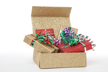 A couple of christmas presents in one big opened Present with a lot of copy space の写真素材