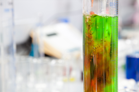 A chemical green alloy in a glass tube の写真素材
