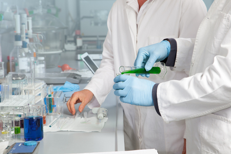 Two Chemists are are working on a new substance in their Laboratory の写真素材
