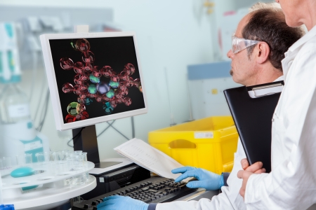 A Chemist Assistant is teached by her Professor in Atom Structure の写真素材