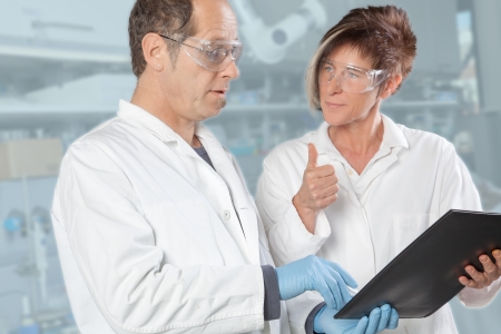 A Team of chemist are discussing the result of an analytical test の写真素材
