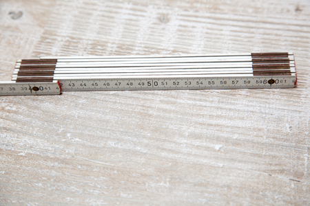 A Yardstick on a laminate boardの写真素材