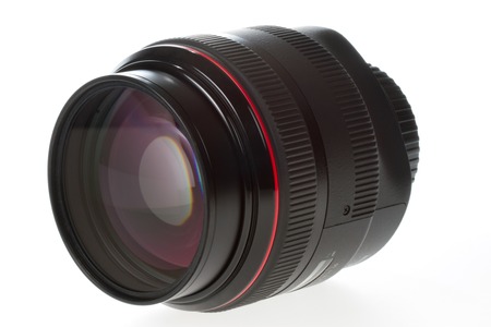 A big photo optical lens on a white background with some copyspace の写真素材