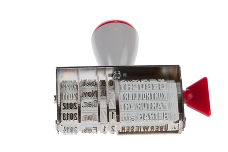 A stamp with a date and some german words on a white background の写真素材