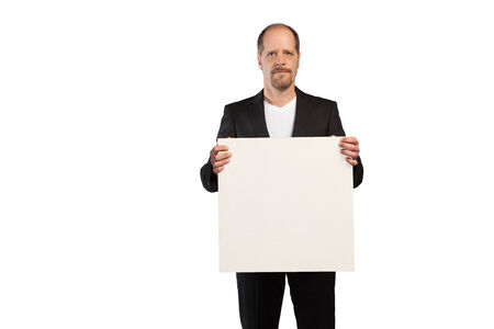 A blank board in the hands of a Businessman on a white background の写真素材