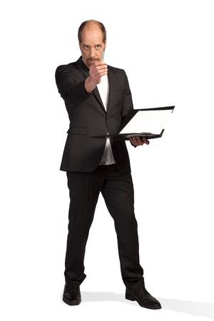 A Businessman with a notepad and pen isolated on a white background の写真素材