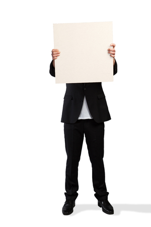 A Sales Director is hidden behind a white clipboard の写真素材