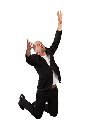 A praying Businessman isolated on a white background without shadows の写真素材