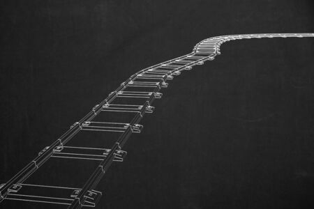 A train railway illustrated with white chalk on a dark chalkboard.の写真素材