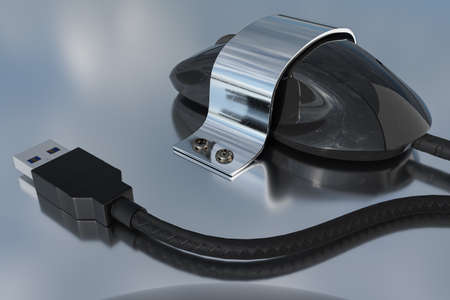A computer mouse is fixed with a metal holder and screws to a reflective tabletop.の写真素材