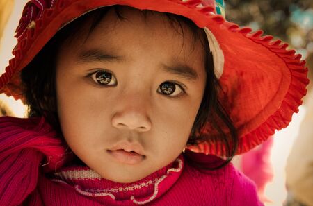 Lam Dong Province, Vietnam - January 24, 2015: The children's face before receiving gifts of ethnic minority children in the highlands. T?t c? gift for poor children come from a charity groupのeditorial素材