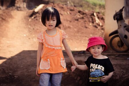 Lam Dong Province, Vietnam - January 24, 2015: The children's face before receiving gifts of ethnic minority children in the highlands. T?t c? gift for poor children come from a charity groupのeditorial素材