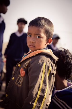 Lam Dong Province, Vietnam - January 24, 2015: The children's face before receiving gifts of ethnic minority children in the highlands. T?t c? gift for poor children come from a charity groupのeditorial素材