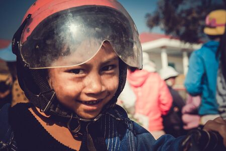 Lam Dong Province, Vietnam - January 24, 2015: The children's face before receiving gifts of ethnic minority children in the highlands. T?t c? gift for poor children come from a charity group.のeditorial素材