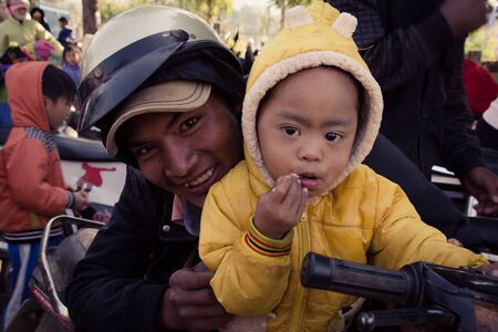 Lam Dong Province, Vietnam - January 24, 2015: The children's face before receiving gifts of ethnic minority children in the highlands. T?t c? gift for poor children come from a charity group.のeditorial素材
