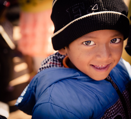 Lam Dong Province, Vietnam - January 24, 2015: The children's face before receiving gifts of ethnic minority children in the highlands. T?t c? gift for poor children come from a charity group.のeditorial素材