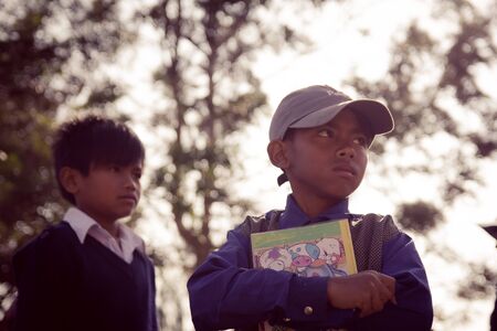 Lam Dong Province, Vietnam - January 24, 2015: The children's face before receiving gifts of ethnic minority children in the highlands. T?t c? gift for poor children come from a charity group.のeditorial素材