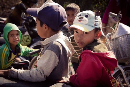 Lam Dong Province, Vietnam - January 24, 2015: The children's face before receiving gifts of ethnic minority children in the highlands. T?t c? gift for poor children come from a charity group.のeditorial素材