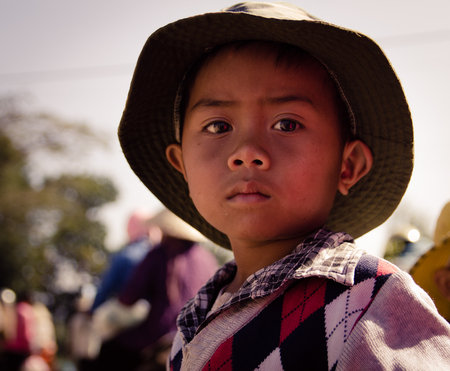 Lam Dong Province, Vietnam - January 24, 2015: The children's face before receiving gifts of ethnic minority children in the highlands. T?t c? gift for poor children come from a charity group.のeditorial素材