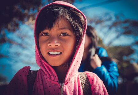Lam Dong Province, Vietnam - January 24, 2015: The children's face before receiving gifts of ethnic minority children in the highlands. T?t c? gift for poor children come from a charity group.のeditorial素材