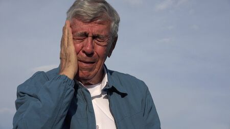 Sad Elderly Old Man With Toothacheの写真素材