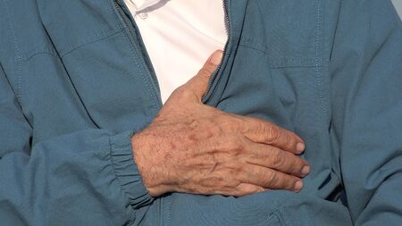 Elderly Man With Chest Pain Or Heart Conditionの写真素材