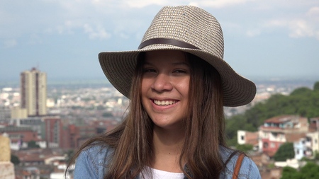 Smiling Female Teen Wearing Hatの写真素材