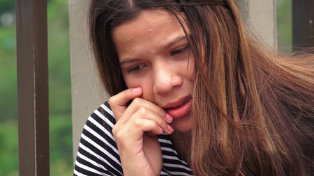 Heartbroken Or Hopeless Teen Girlの写真素材