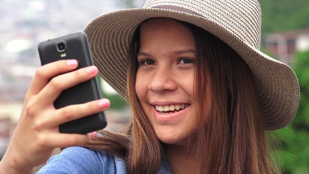 Pretty Female Teen Taking Selfyの写真素材