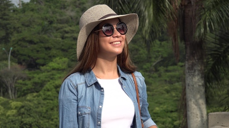 Teen Girl With Sunglasses On Sunny Dayの写真素材
