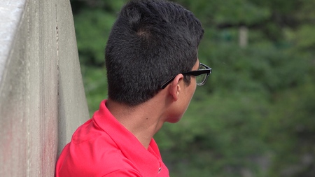 Lonely Neglected Hispanic Teen Boyの写真素材