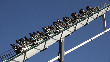 People On Roller Coaster On Summer Vacation