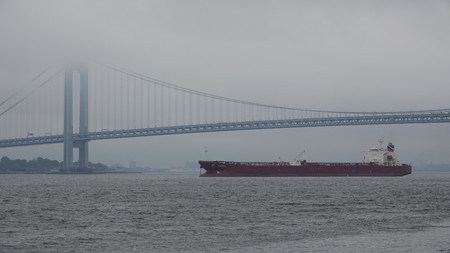Cargo Ship And Suspension Bridge In Fogのeditorial素材