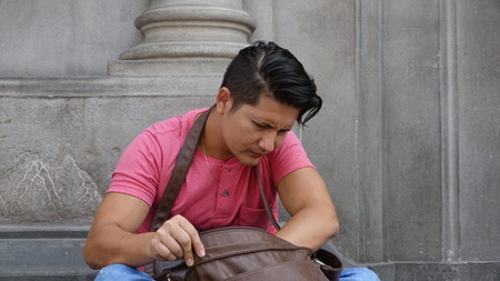 Man With Leather Satchel