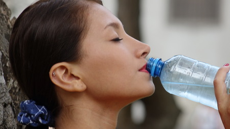 Teen Girl Drinking Water
