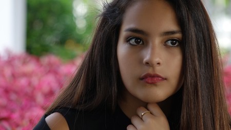 Serious Hispanic Teen Girlの写真素材