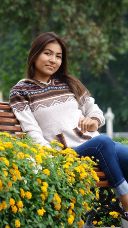 Sitting Youthful Girlの写真素材