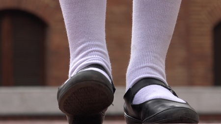 Girl Tapping Her Foot Wearing White Socksの写真素材
