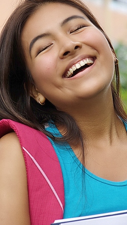 Happy Minority Student Close Upの写真素材