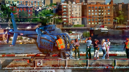 Passengers And Helicopter At Pierのeditorial素材