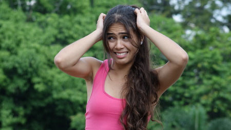 Stressful Latina Female Youngsterの写真素材