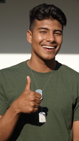 Male Soldier With Thumbs Upの写真素材