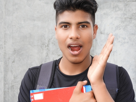 Surprised Young Male Studentの写真素材